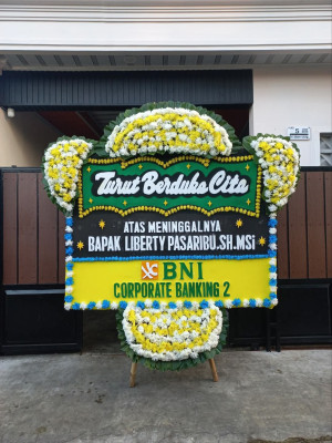 Papan Bunga Duka di Tetap