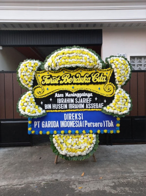 Papan Bunga Duka di Tetap