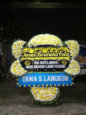 Papan Bunga Duka di Tetap