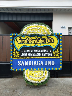 Papan Bunga Duka di Tetap