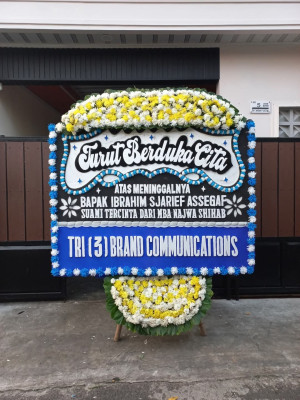 Papan Bunga Duka di Tetap